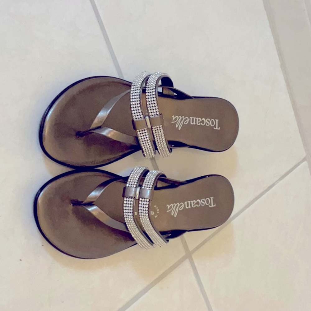 These toscanella  psandals are new and a size six